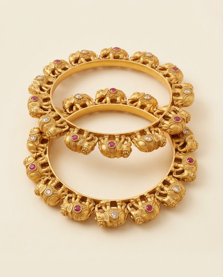 Gaja — Antique-gold elephant motif bangles, pair