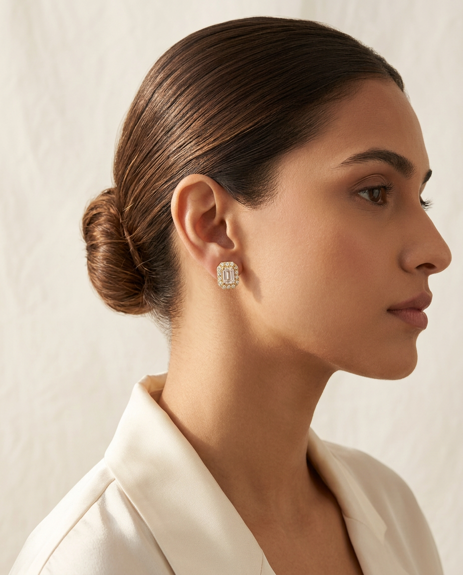 Model wearing the Heera emerald-cut halo stud earrings
