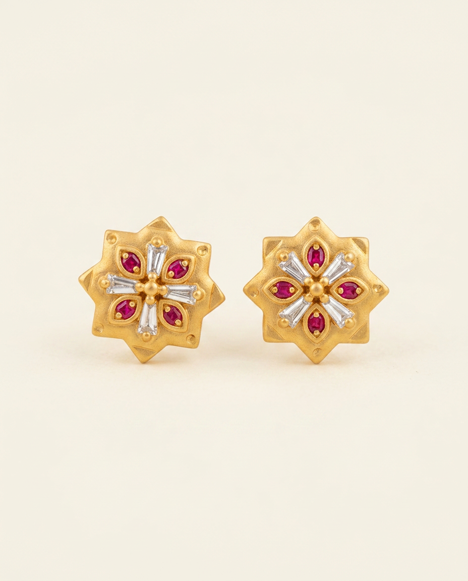 Kesar — Matte-gold star studs with ruby-red stones