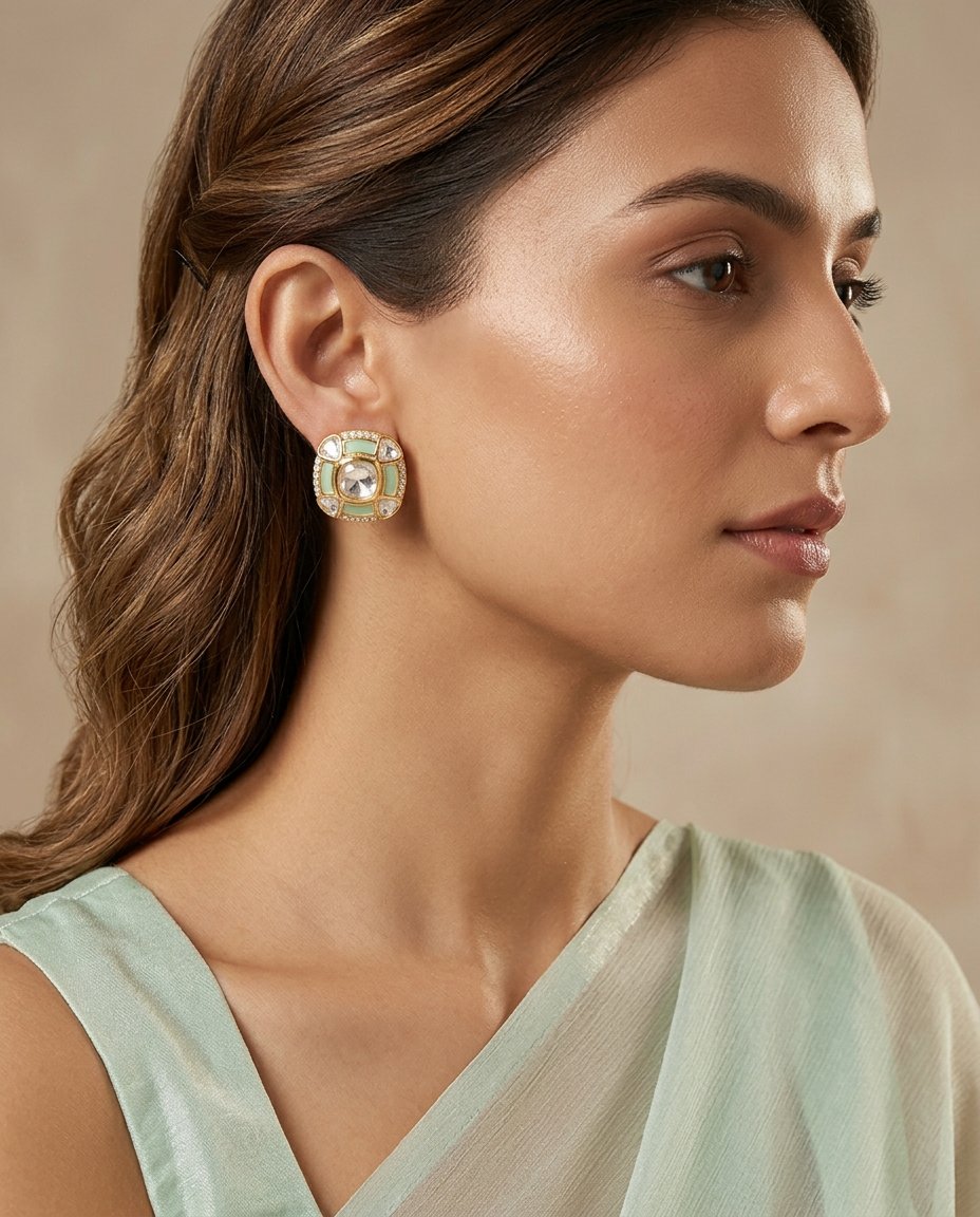 Model wearing the Pudina mint enamel and polki cushion stud earrings