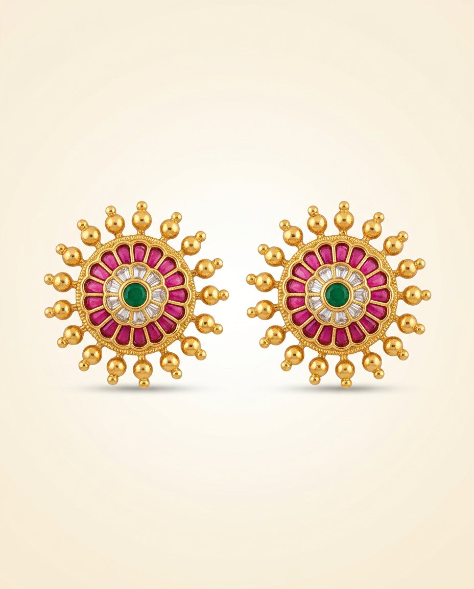 Surya — Ruby sunburst studs with emerald centre
